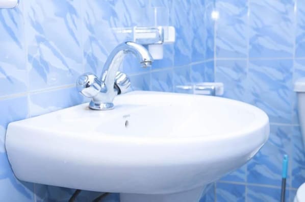Shower, free toiletries, slippers, towels