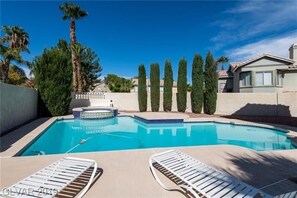 Outdoor pool, a heated pool - The Las Vegas Retreat, Heated Pool and Hot Tub. (Henderson)