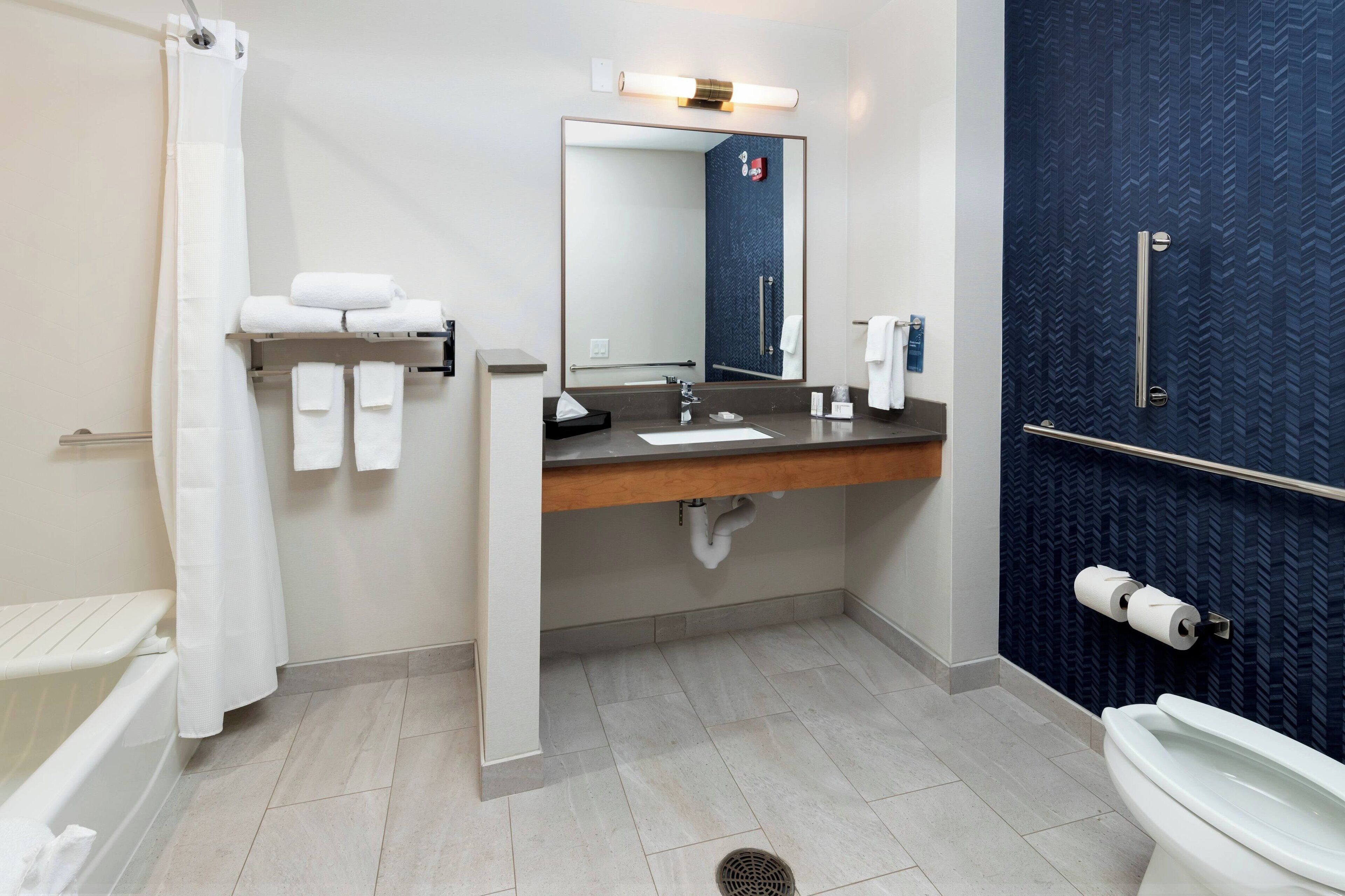 free toiletries, hair dryer, soap, shampoo