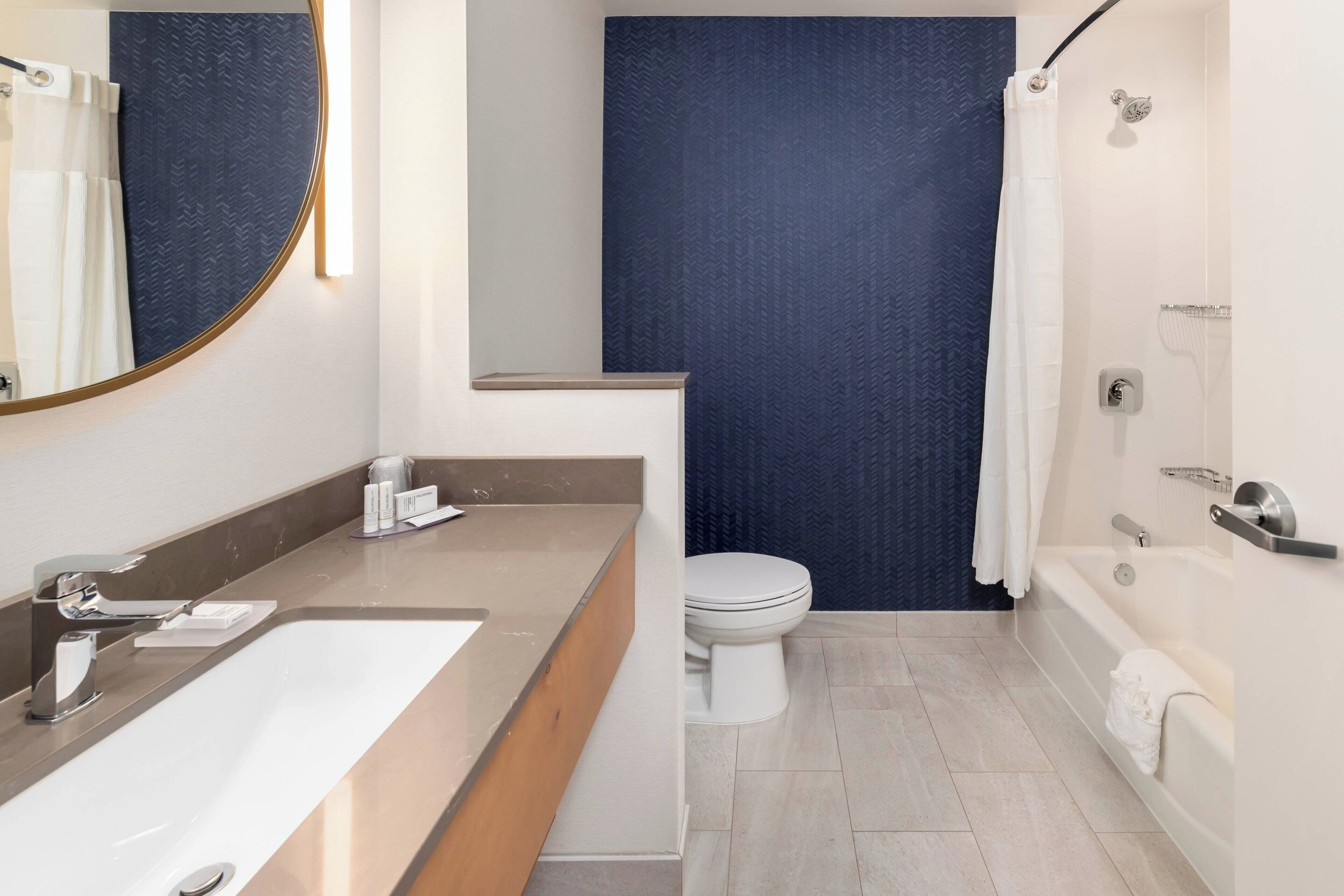 free toiletries, hair dryer, soap, shampoo