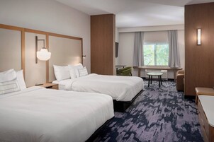 Suite, Multiple Beds | Desk, laptop workspace, blackout drapes, iron/ironing board