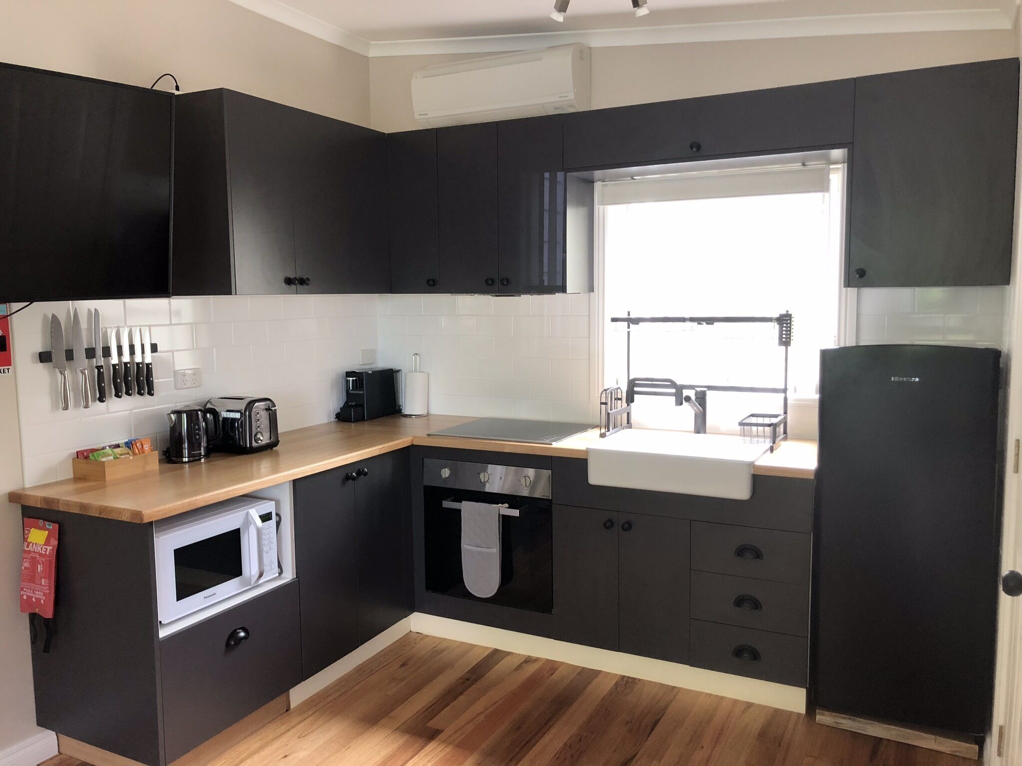 Coffee/tea maker, fridge, microwave, oven