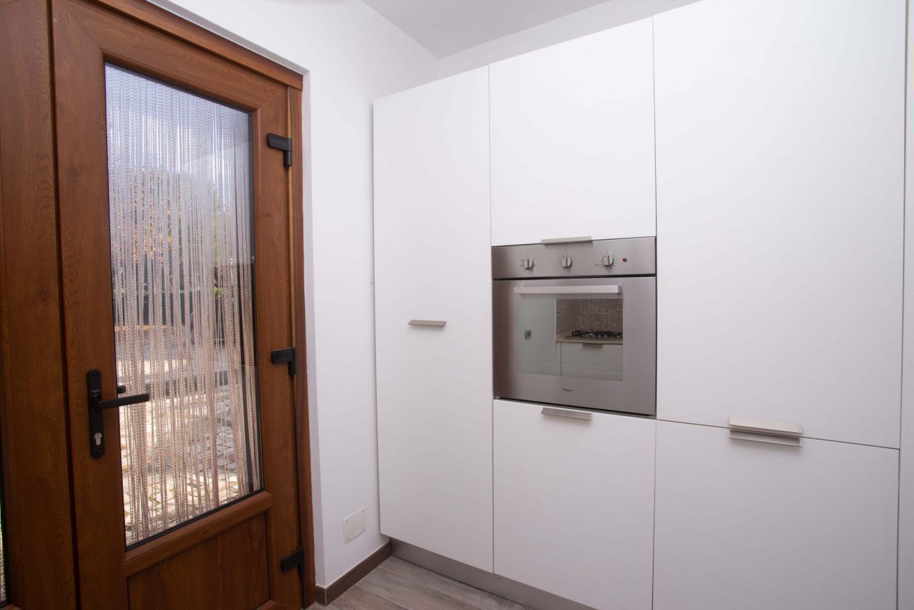 Fridge, oven, dishwasher, dining tables