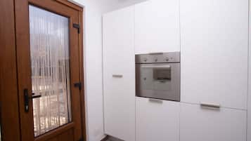 Fridge, oven, dishwasher, dining tables