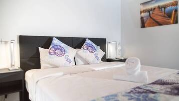 Standard Quadruple Room | Premium bedding, iron/ironing board, free WiFi, bed sheets