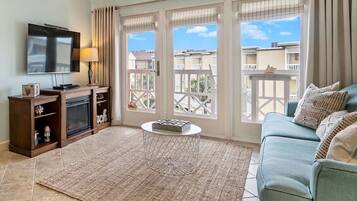 Smart TV, fireplace, DVD player, books