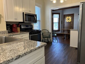 Fridge, microwave, oven, stovetop - Americana. Large Historic Home. Dogs Welcome. Walk to Downtown and Beach! (South Haven)