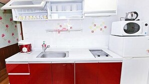 Duplex | Private kitchenette | Full-size fridge, stovetop, electric kettle, cookware/dishes/utensils