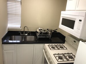 Fridge, microwave, oven, stovetop - Freshly Renovated Studio with full kitchen, bathroom, and private gate, parking (Houston)