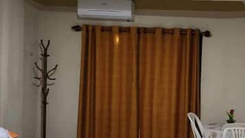 Comfort Room | Individually decorated, laptop workspace, blackout curtains