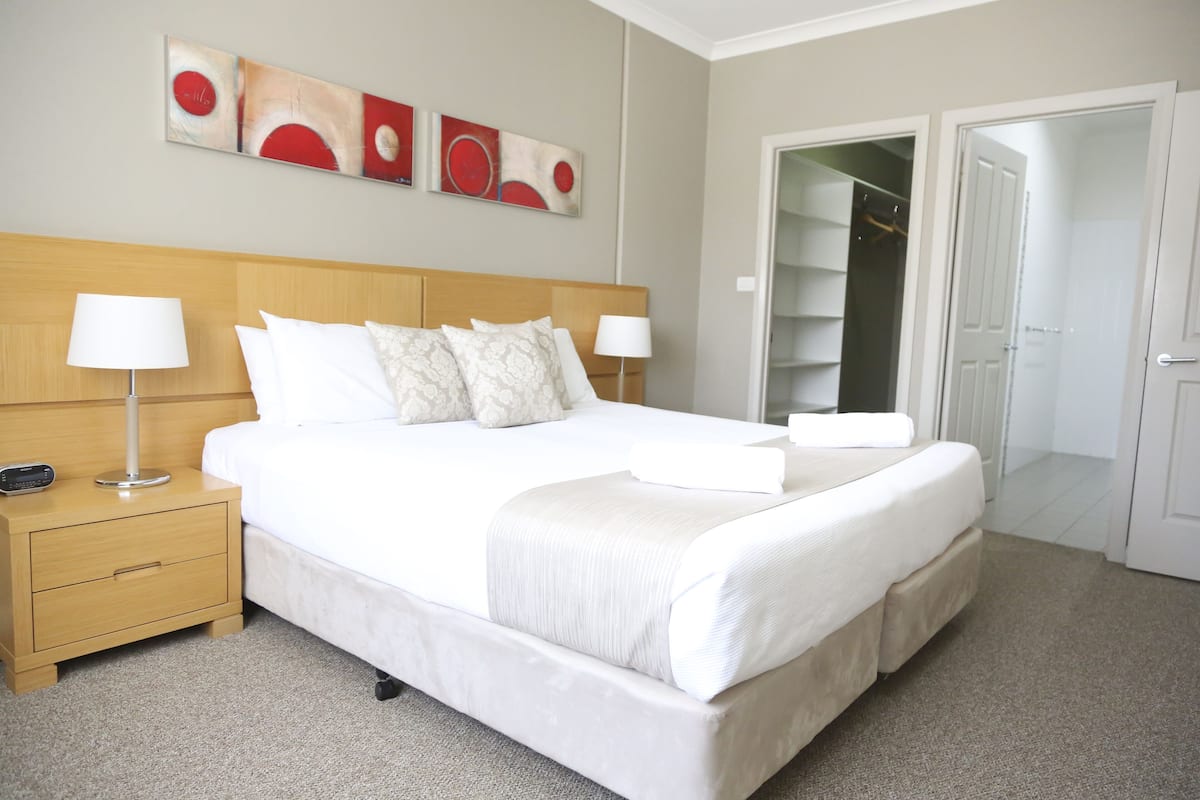 2 bedrooms, premium bedding, desk, laptop workspace
