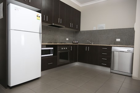 Two Bedroom Apartment | Private kitchen | Fridge, microwave, electric kettle, toaster