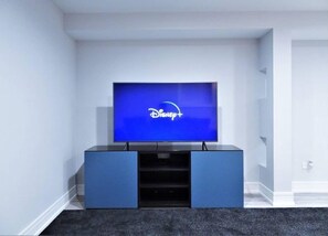 Enjoy entertainment at home with a flat-screen TV and access to popular streaming services.