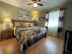 Master bedroom with pillow top King bed, Roku TV, and private bath