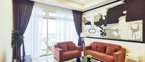 Apartment, 4 Bedrooms (A-36-03) | Living room | Flat-screen TV