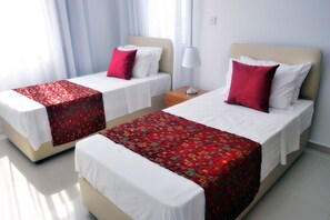 4 slaapkamers, een strijkplank/strijkijzer, gratis wifi, beddengoed