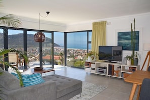 House | Living room | 55-inch TV with satellite channels