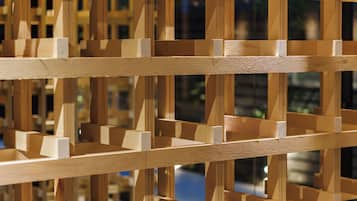 A wooden lattice structure with a grid pattern.