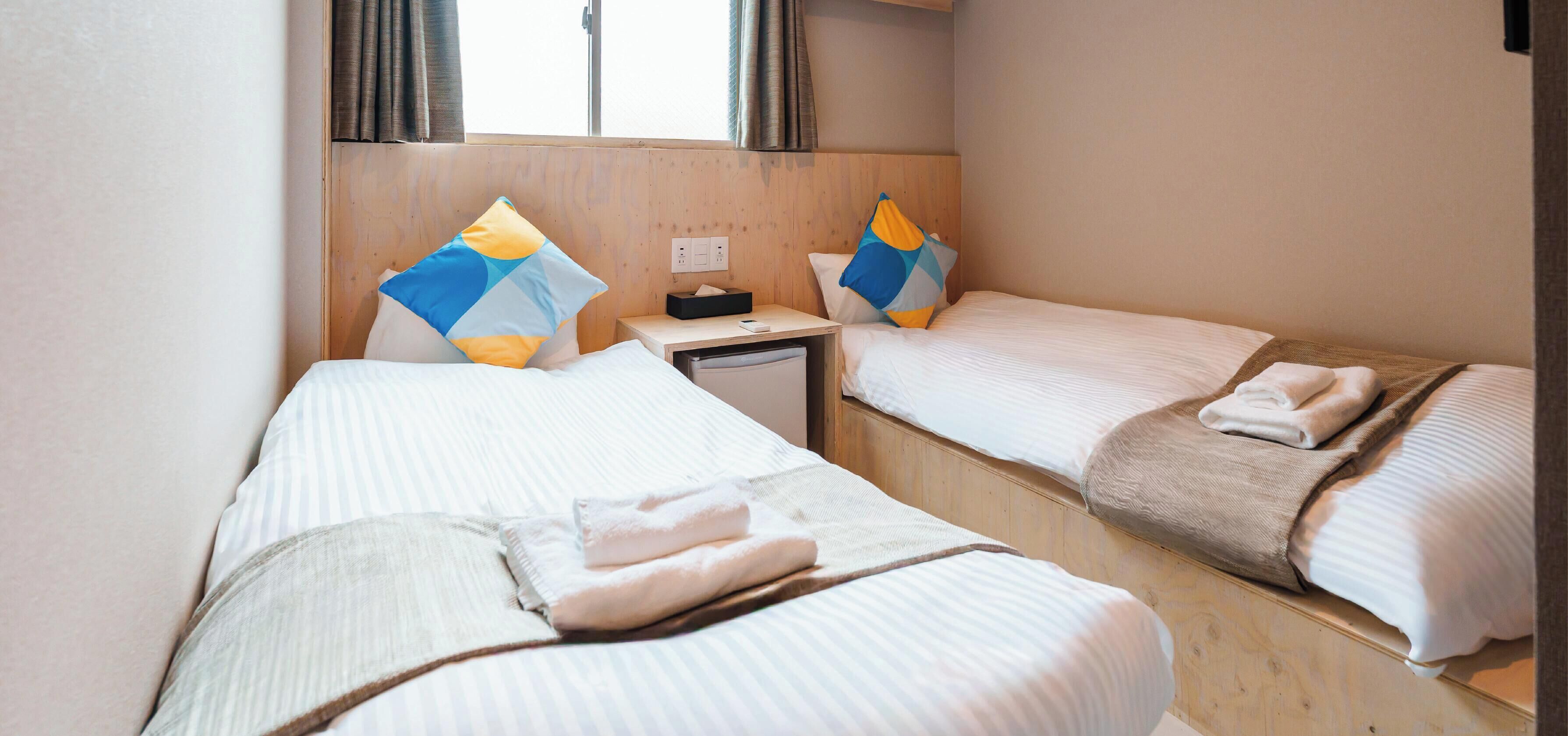 Standard Twin Room Non-Smoking (Shared Shower) | Blackout drapes, free WiFi, bed sheets