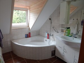 Hair dryer, slippers, towels, soap