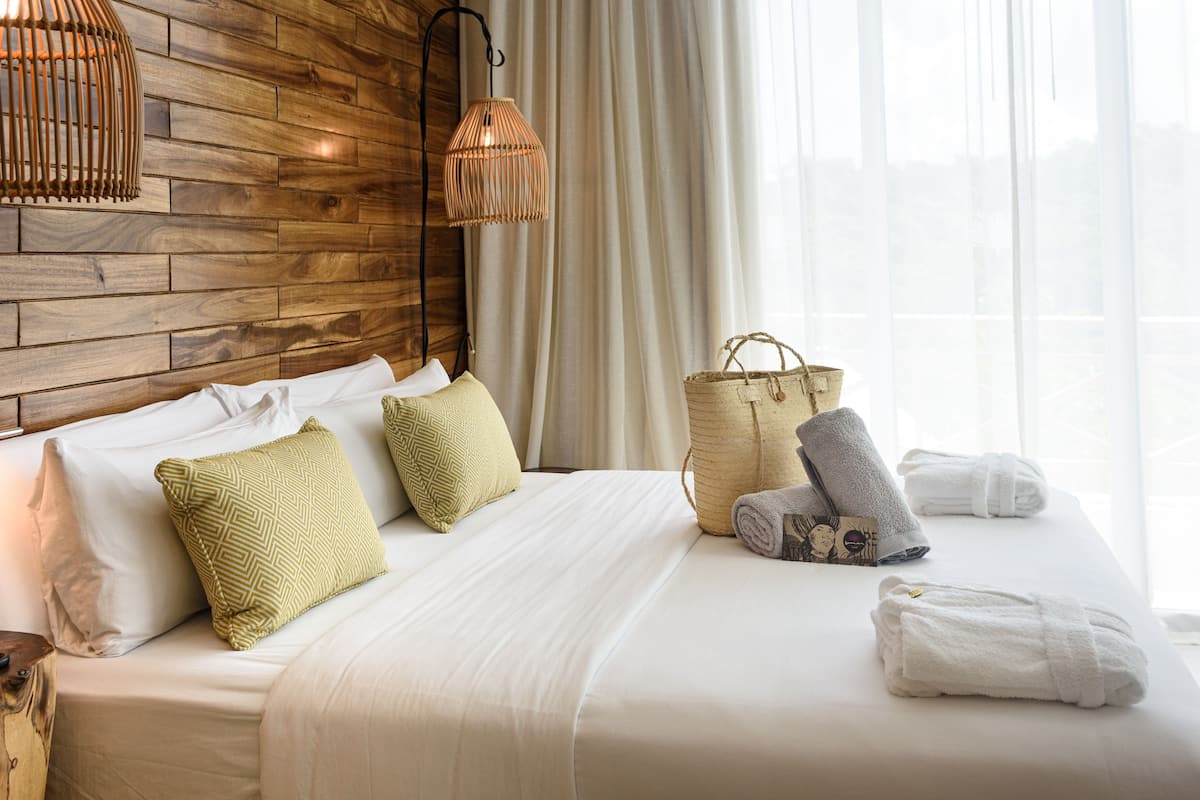 Junior Suite, Non Smoking, Garden View | 1 bedroom, in-room safe, blackout curtains, soundproofing