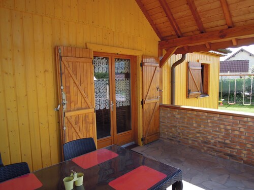 Rental of fenced chalet with barbecue and children's play area