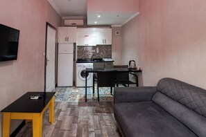Comfort Apartment | Private kitchen | Fridge, oven, electric kettle, dining tables