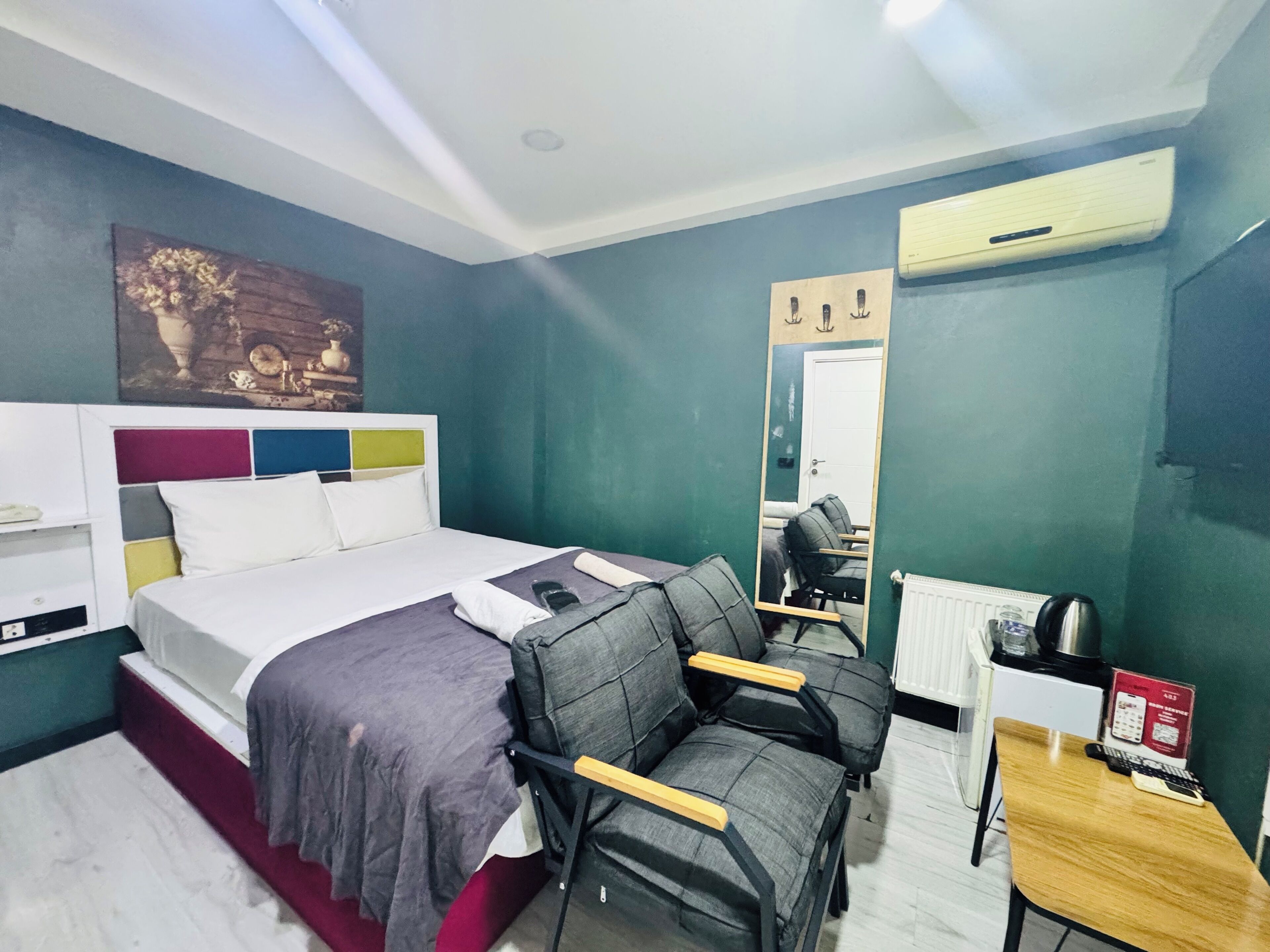 Basic Room | Egyptian cotton sheets, premium bedding, down comforters, in-room safe