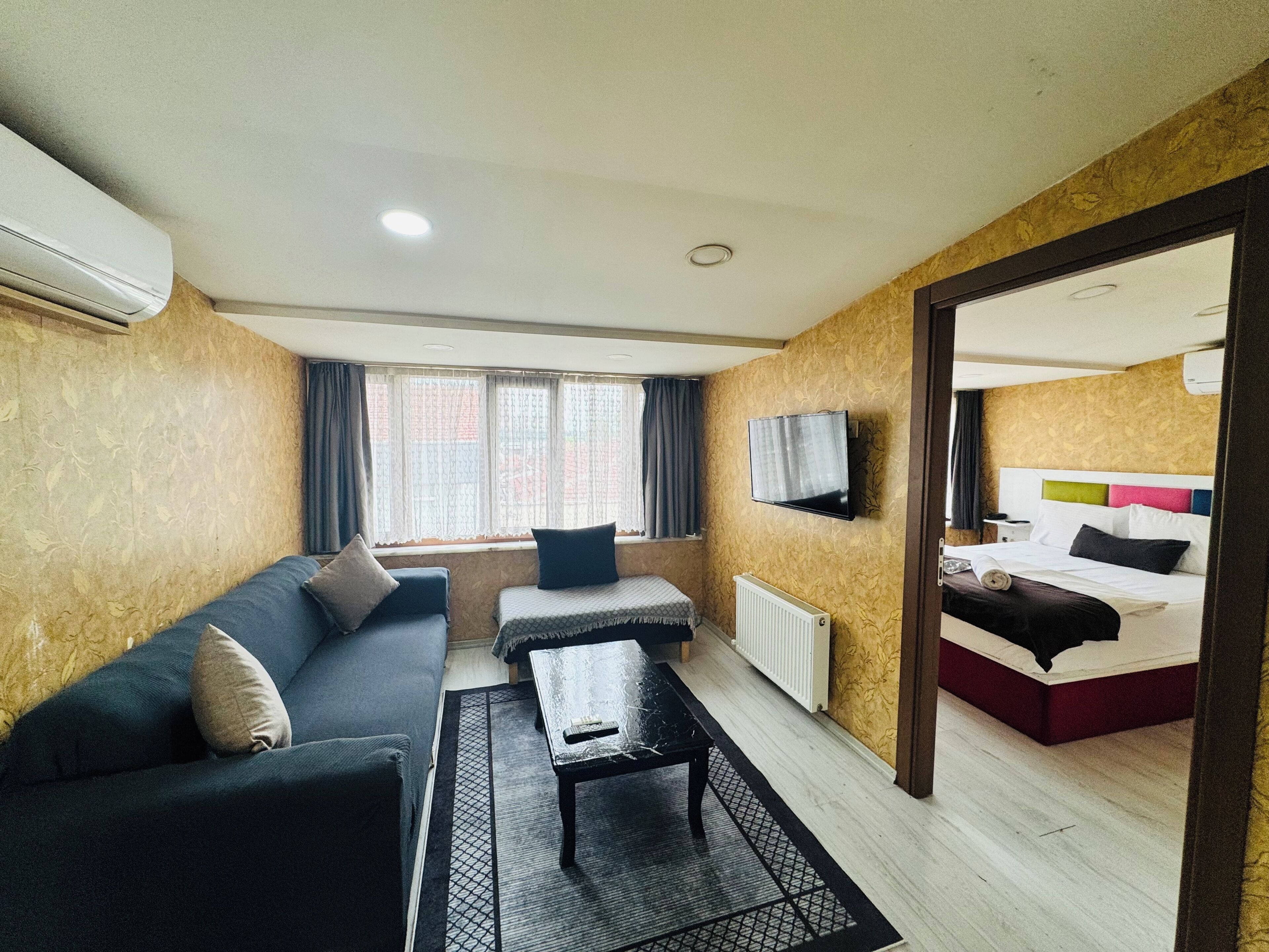 Deluxe Apartment | Egyptian cotton sheets, premium bedding, down comforters, in-room safe