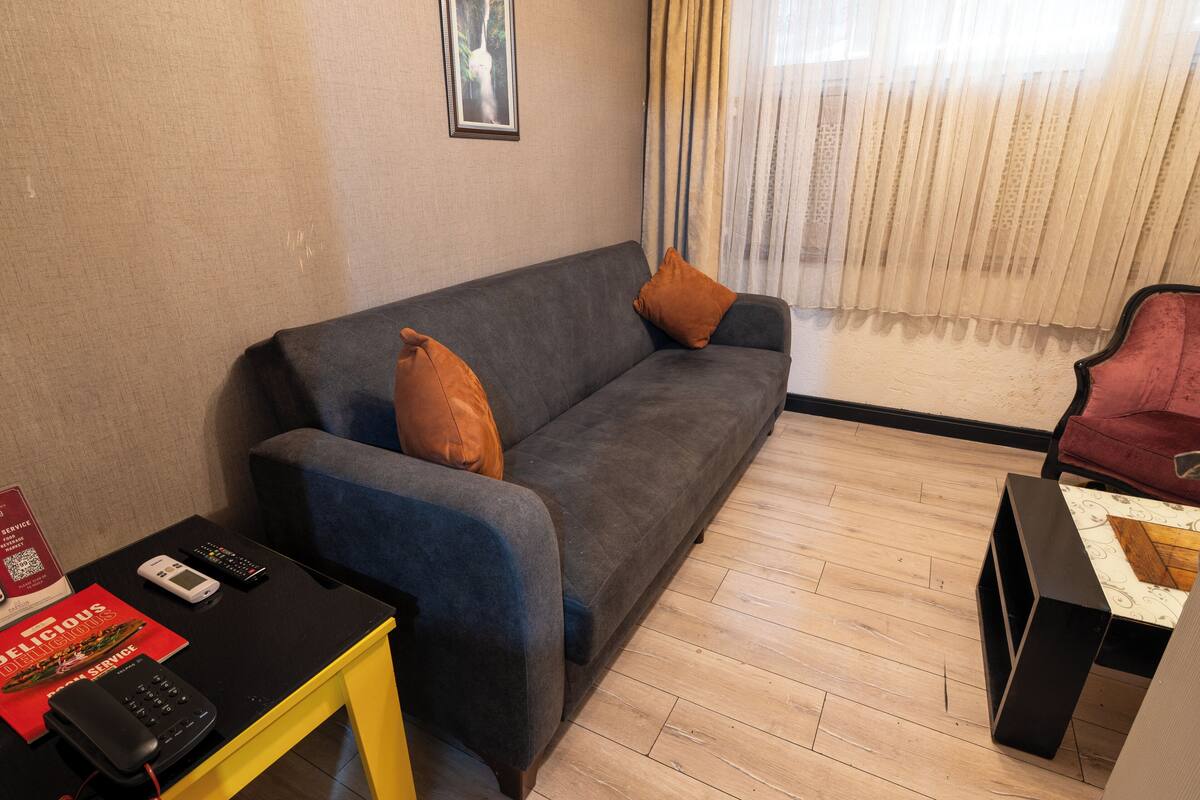 Economy Apartment | 1 bedroom, Egyptian cotton sheets, premium bedding, in-room safe