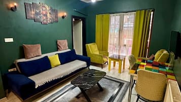 Family Apartment | Private kitchen | Fridge, oven, electric kettle, dining tables