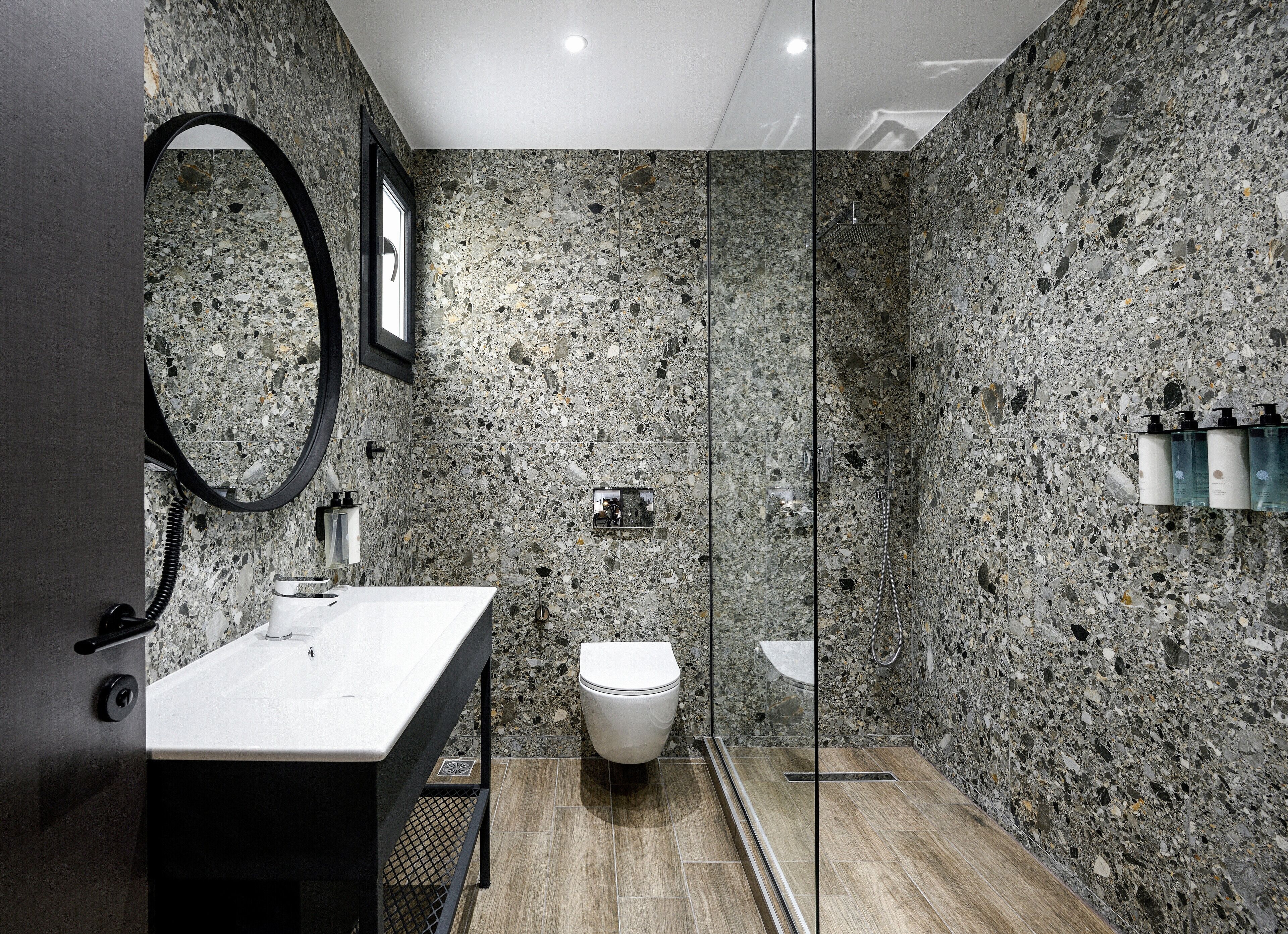 superior comfort room (white tower view) | bathroom | shower, rainfall showerhead, free toiletries, hair dryer