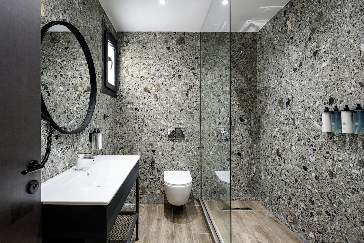 superior comfort room (white tower view) | bathroom | shower, rainfall showerhead, free toiletries, hair dryer