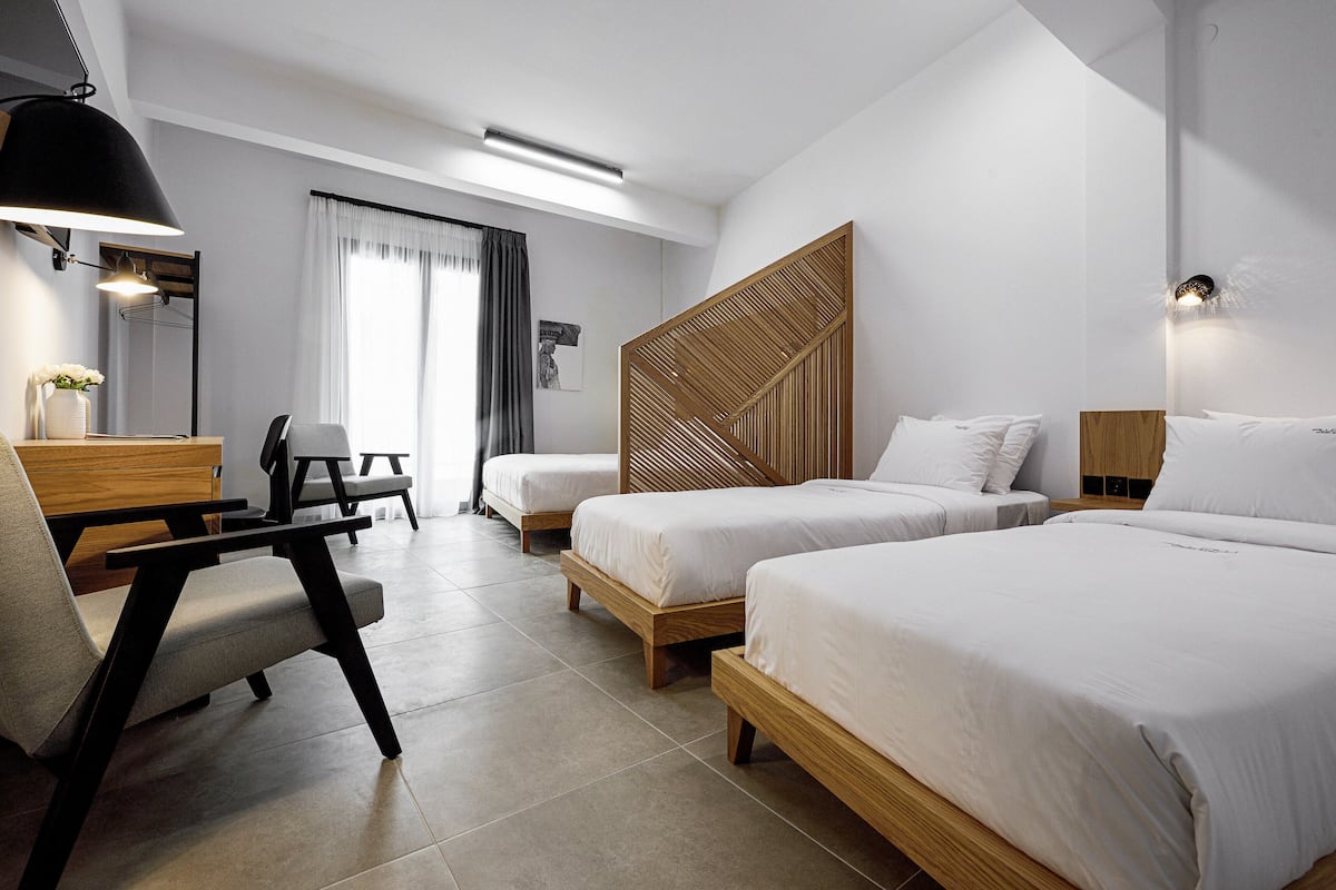 family room (white tower view) | 1 bedroom, in-room safe, individually decorated, desk