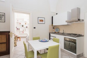 Comfort Apartment, 2 Bedrooms | Private kitchenette | Full-size fridge, oven, stovetop, cookware/dishes/utensils - Il Garbino Suite and Apartment (Lecce)