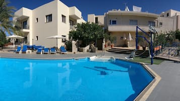 Outdoor pool, open 9:00 AM to 7:00 PM, sun loungers