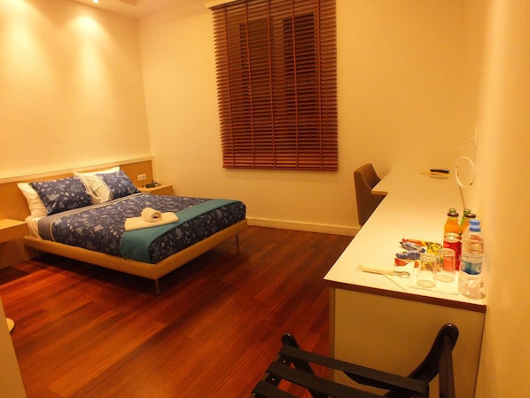 Desk, laptop workspace, blackout curtains, iron/ironing board