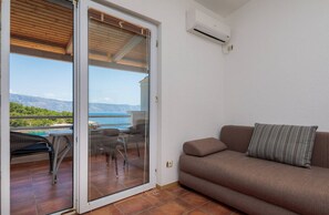 Apartamento, 1 habitación, balcón (4) | Sala de estar | Una televisión LCD