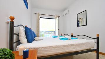 Apartment, 2 Bedrooms, Pool Access, Beachside | 2 bedrooms, in-room safe, iron/ironing board, free WiFi