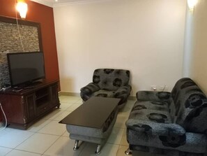 Apartment, 2 Bedrooms | Living area | 32-inch LCD TV with satellite channels, TV - Stoneyard Apartments (Kigali)