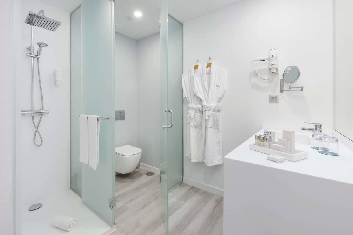 shower, rainfall showerhead, hair dryer, bathrobes