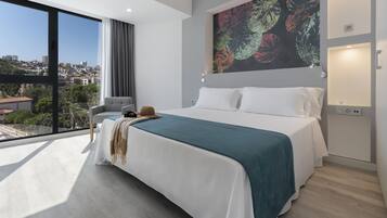 Superior Room | Minibar, in-room safe, desk, laptop workspace