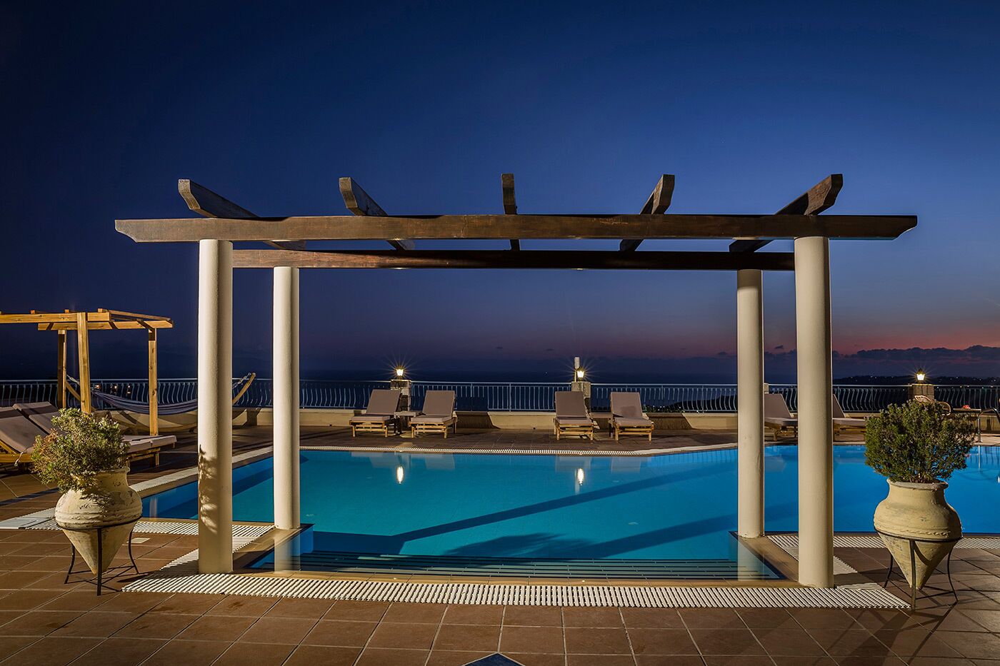 Seasonal outdoor pool, pool umbrellas, pool loungers