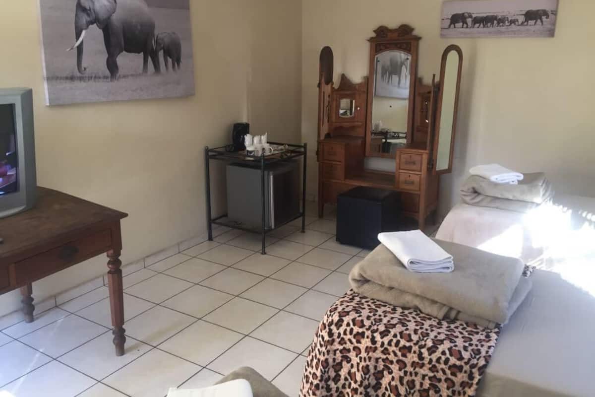 32-inch flat-screen TV with satellite channels, TV