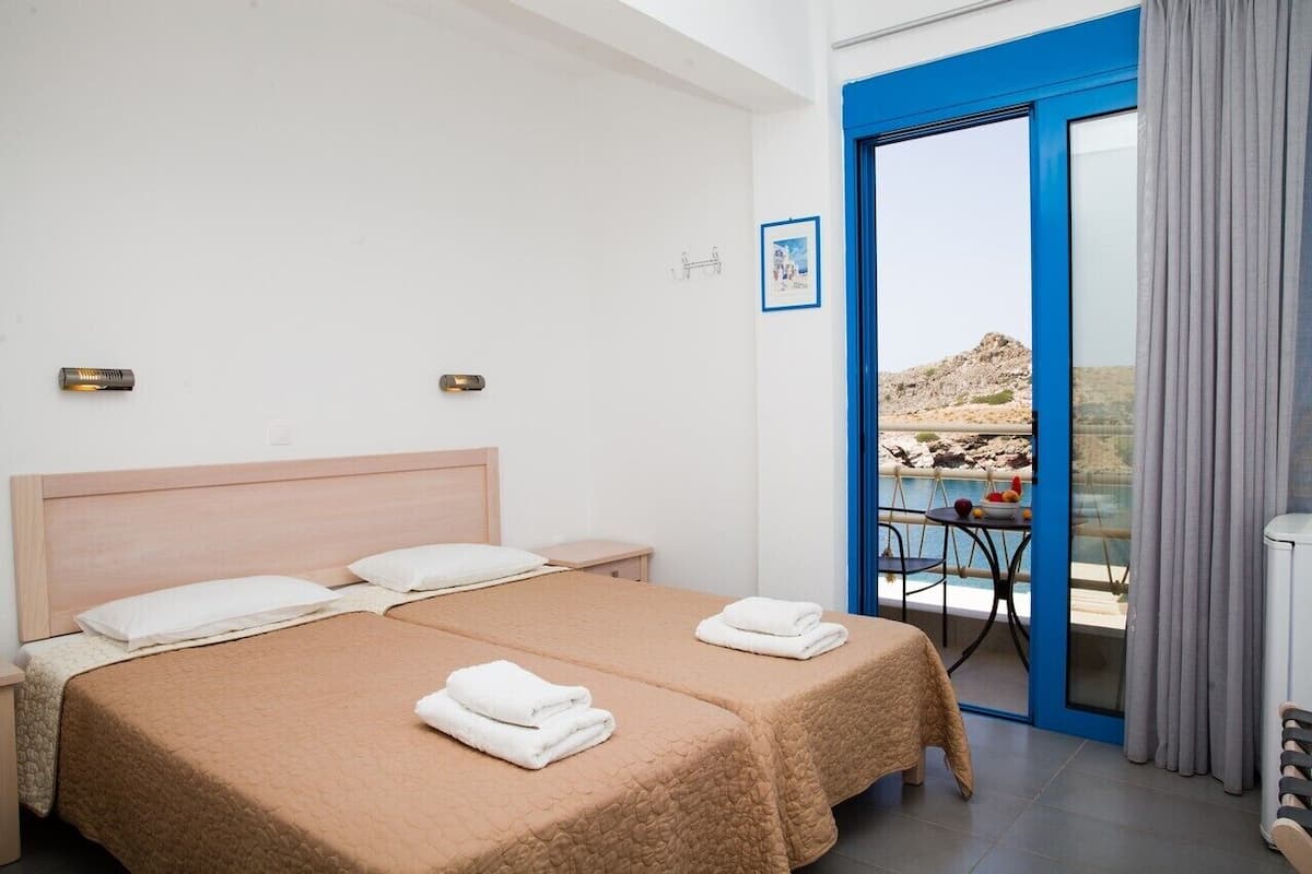 Habitación con 2 camas individuales, Aire acondicionado, vistas al mar | Wifi gratis, ropa de cama, accesible en silla de ruedas