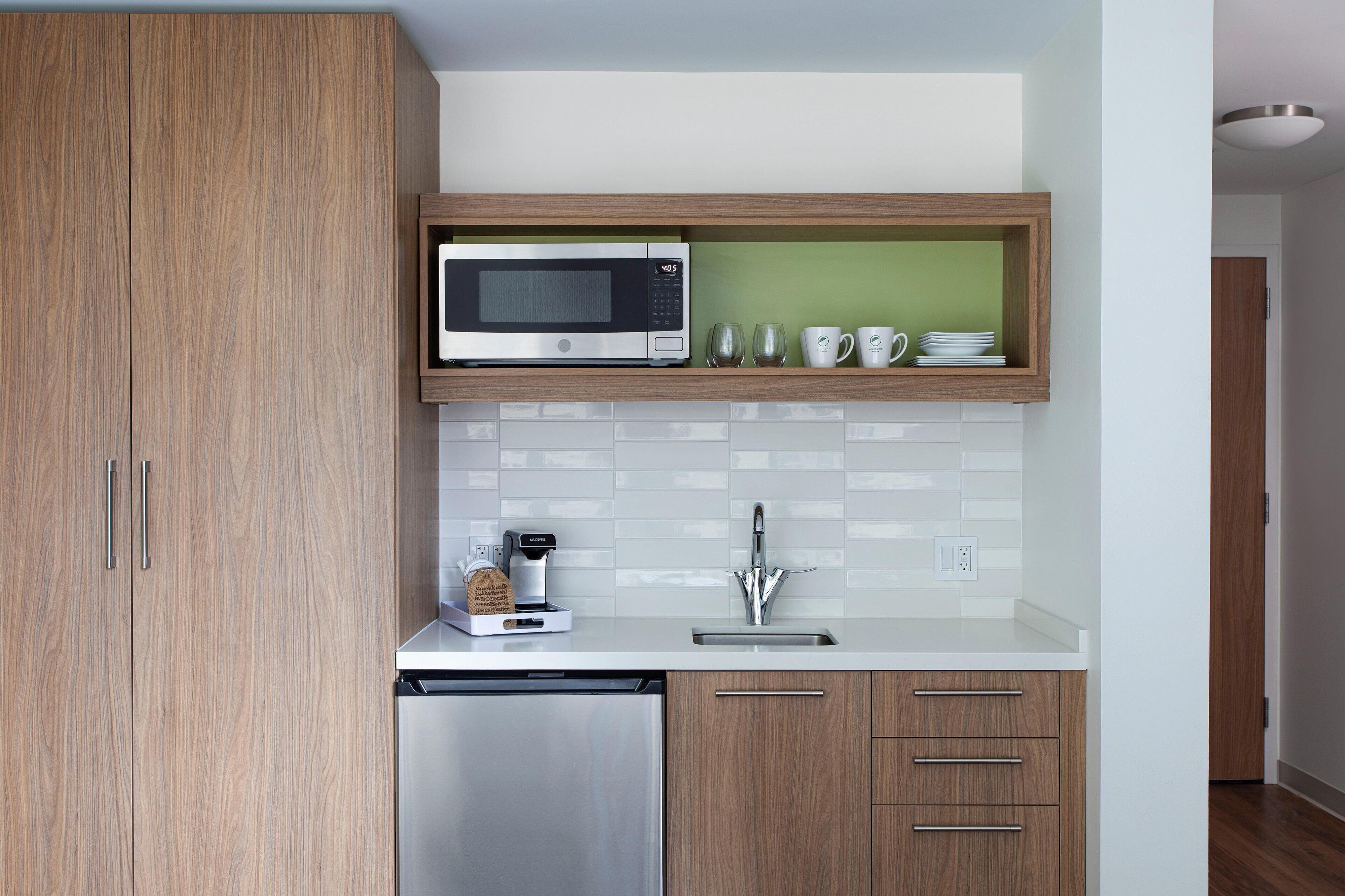 full-sized fridge, microwave, dishwasher, coffee/tea maker