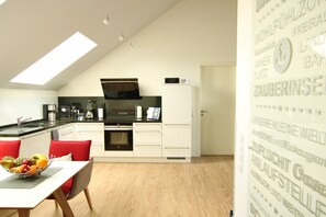 Sonnengarten 20 - Heimathafen | Eigene Küche | Großer Kühlschrank, Mikrowelle, Ofen, Herdplatte