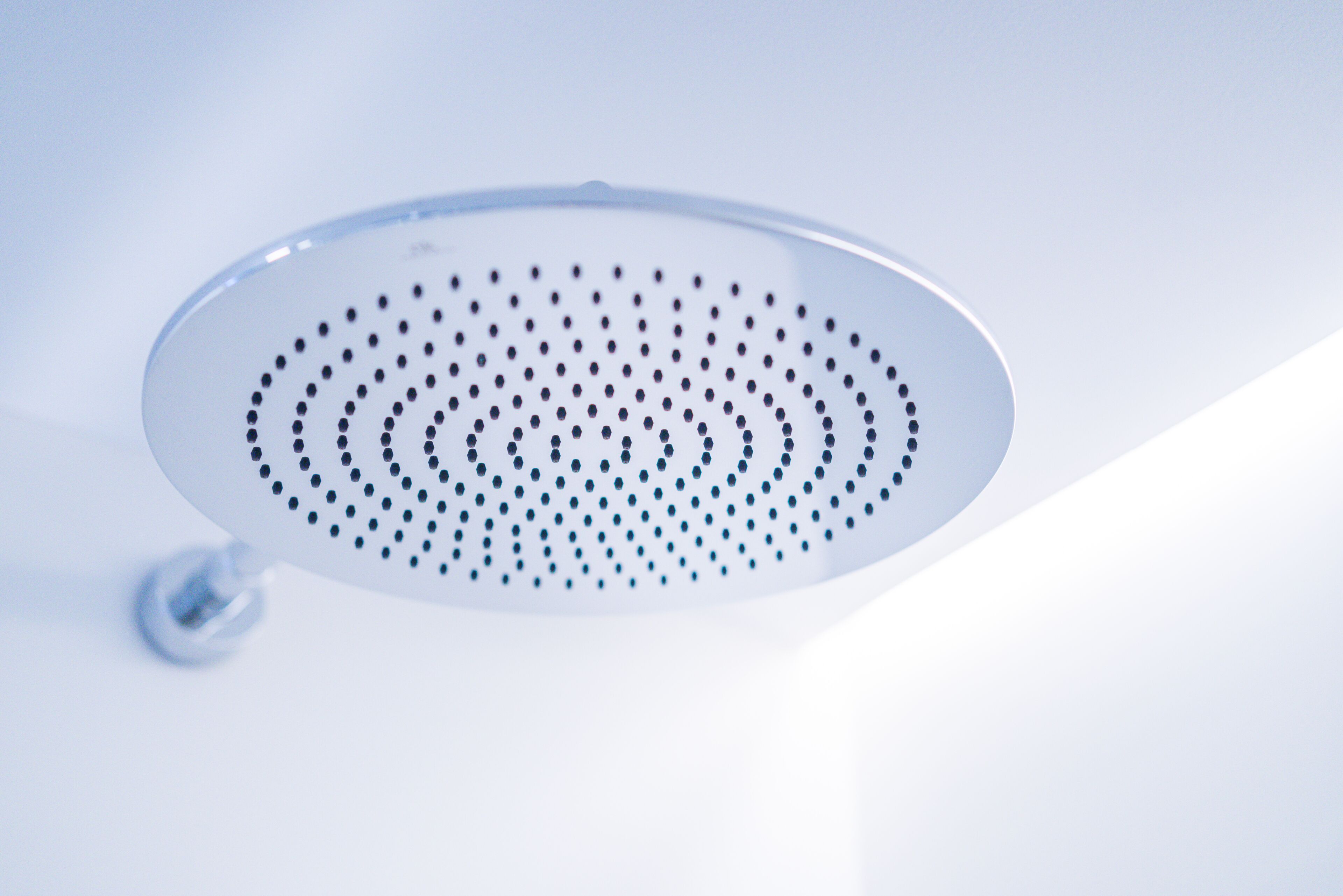 shower, rainfall showerhead, hair dryer, towels