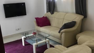Apartemen, 2 kamar tidur | Area keluarga | TV layar datar