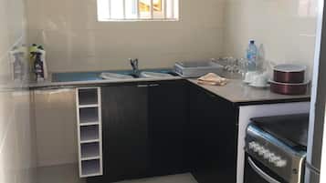 Apartemen, 2 kamar tidur | Dapur pribadi | Lemari es, microwave, oven, dan kompor